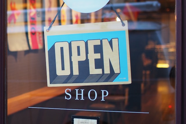 image of a sign saying open shop
